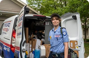 standard heating & air employee smiling into camera