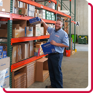 team member stocking shelves