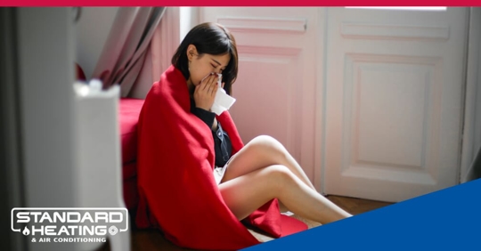 Sneezing woman.
