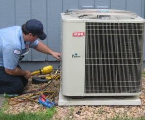 man fixing the compressor