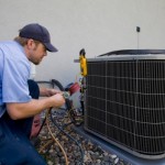 Man checking on an ac unit