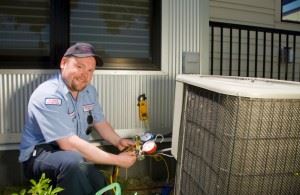 Smiling man checking a unit