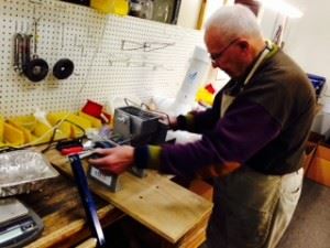 Elderly man in a workshop
