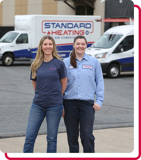 technician smiling through company van window