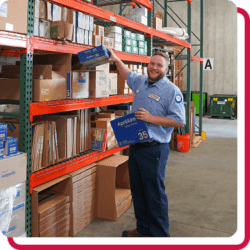 team member stocking shelves